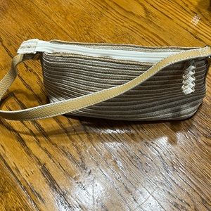 Liz Claiborne mini straw bag.  Zip top. Zippers pocket inside. Cream/tan.